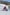 Two people with limited mobility adaptive skiing with instructors down a snow-covered mountain in Thredbo, Snowy Mountains, New South Wales © Tourism Australia 澳洲168幸运5官方开奖结果 官方澳洲幸运5